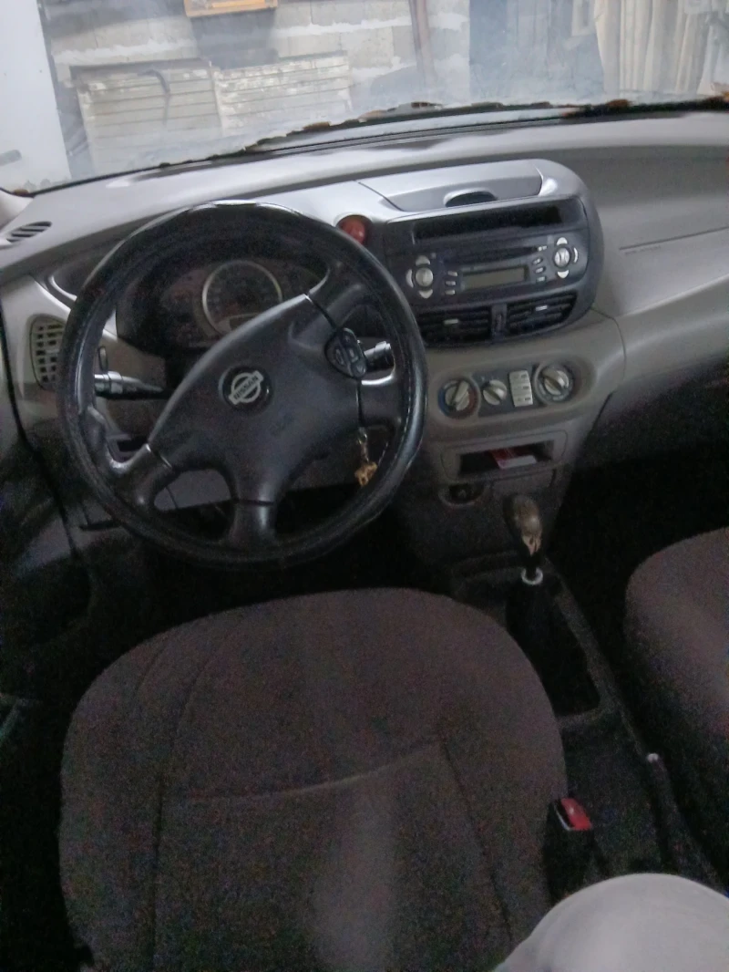 Nissan Almera tino, снимка 5 - Автомобили и джипове - 52723431