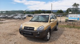 Hyundai Tucson 2.0i 4x4, снимка 1 - Автомобили и джипове - 41701404