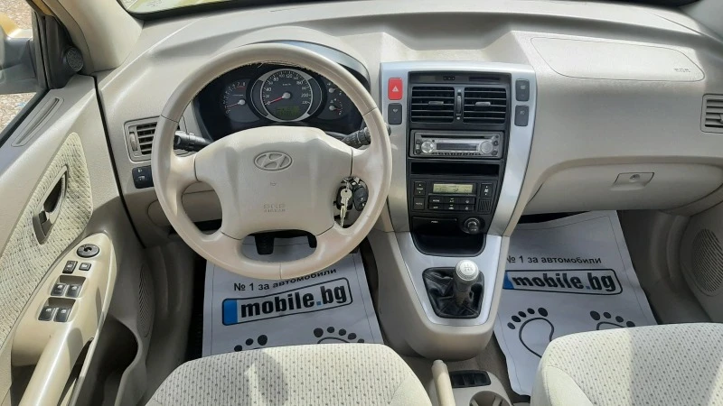 Hyundai Tucson 2.0i 4x4, снимка 15 - Автомобили и джипове - 41701404