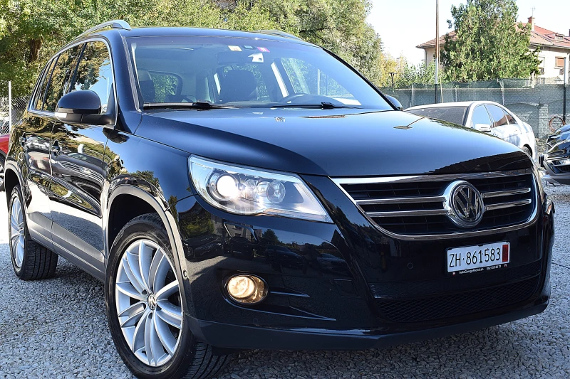 VW Tiguan 2.0ШВЕЙЦАРИЯ/4x4/АВТОМАТИК/САМОПАРКИРАНЕ/НАВИ/DVD, снимка 3 - Автомобили и джипове - 47386033