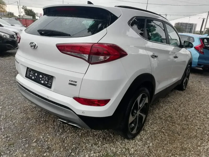 Hyundai Tucson 2.0 CRDI 4X4, снимка 6 - Автомобили и джипове - 52404905