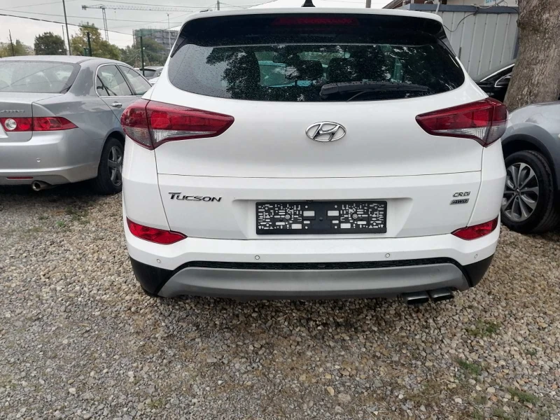 Hyundai Tucson 2.0 CRDI 4X4, снимка 2 - Автомобили и джипове - 52404905