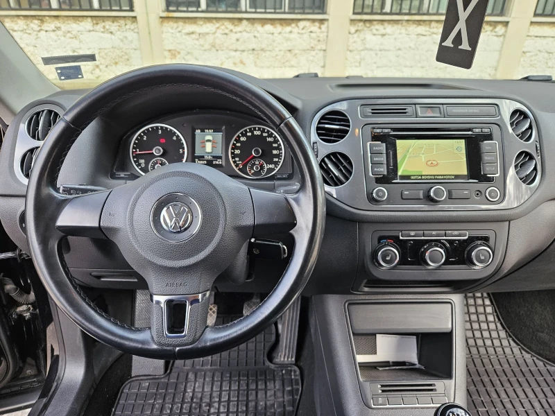 VW Tiguan 2.0 TDI /4-MOTION/ПОДГРЕВ/XENON/NAVI/ТОП СЪСТОЯНИЕ, снимка 11 - Автомобили и джипове - 49243770