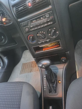 Opel Astra 1.6i....ПЪЛЕН АВТОМАТ , снимка 13