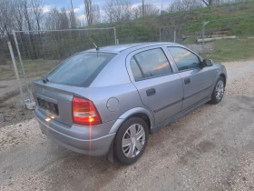Opel Astra 1.6i....ПЪЛЕН АВТОМАТ  - 1299 € / 2540.62 лв. - 42196884 6