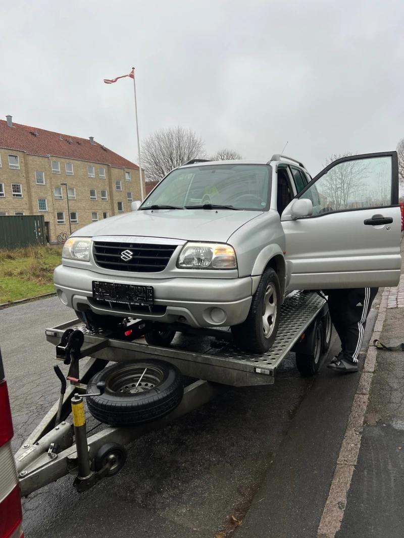 Suzuki Grand vitara, снимка 13 - Автомобили и джипове - 48658172