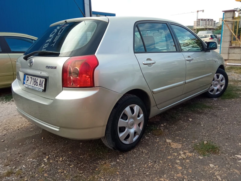 Toyota Corolla 1.4i 16V 97к.с., снимка 4 - Автомобили и джипове - 46974749