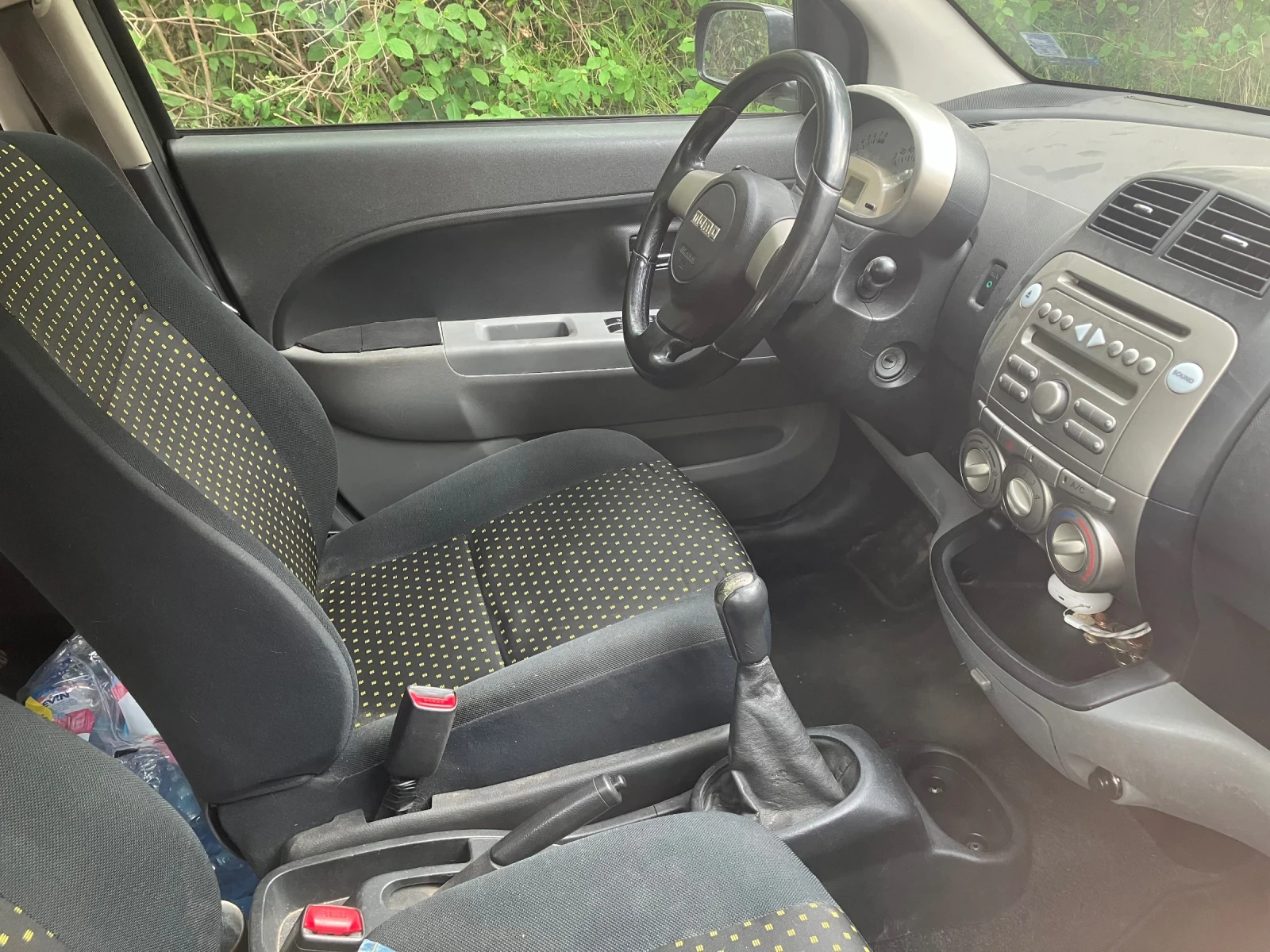 Daihatsu Sirion 1.3 4WD, снимка 4 - Автомобили и джипове - 55299261