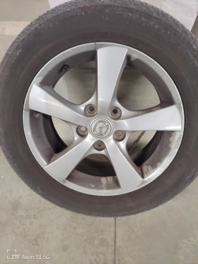        205/60R16  Mazda