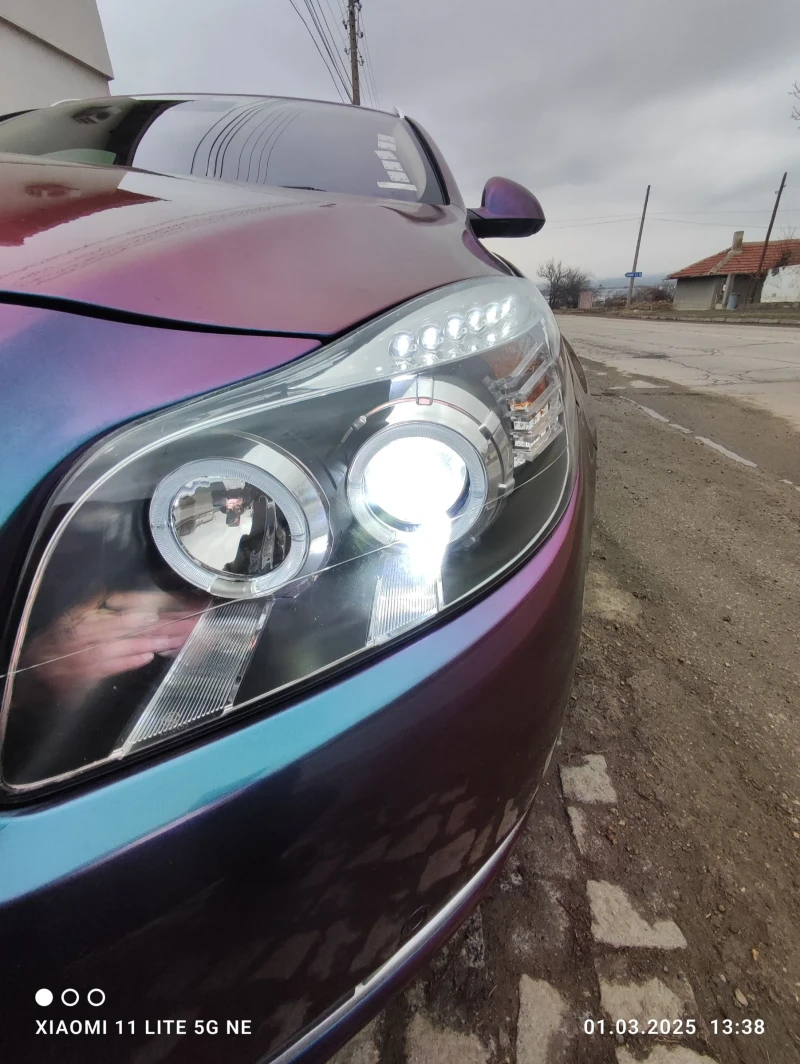 Opel Insignia 2000, снимка 11 - Автомобили и джипове - 52214310