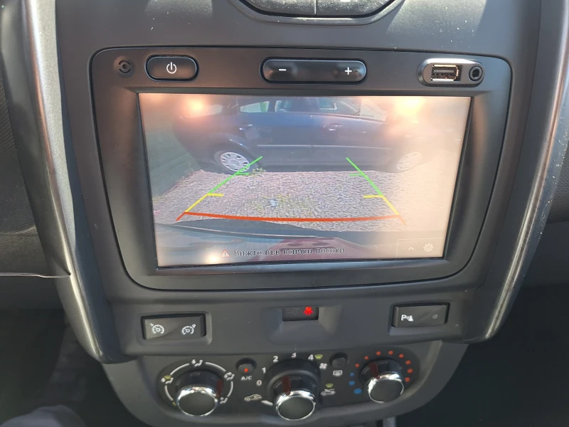 Dacia Duster 1.2 i, снимка 15 - Автомобили и джипове - 50050603