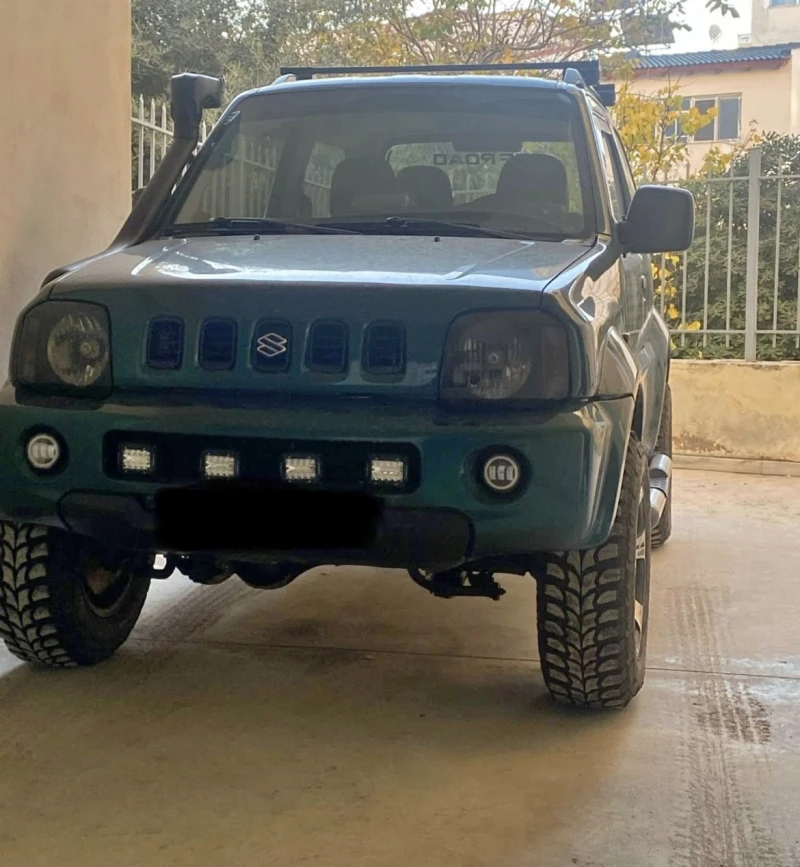 Suzuki Jimny, снимка 4 - Автомобили и джипове - 52842630