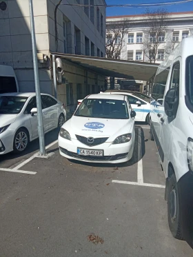 ������ Mazda 3
