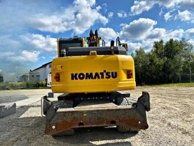      Komatsu PW148-8