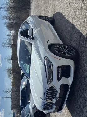 ������ BMW i5