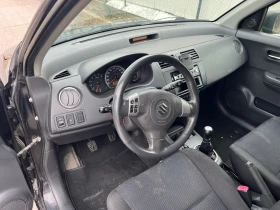 Suzuki Swift 1.3 4х4, снимка 13