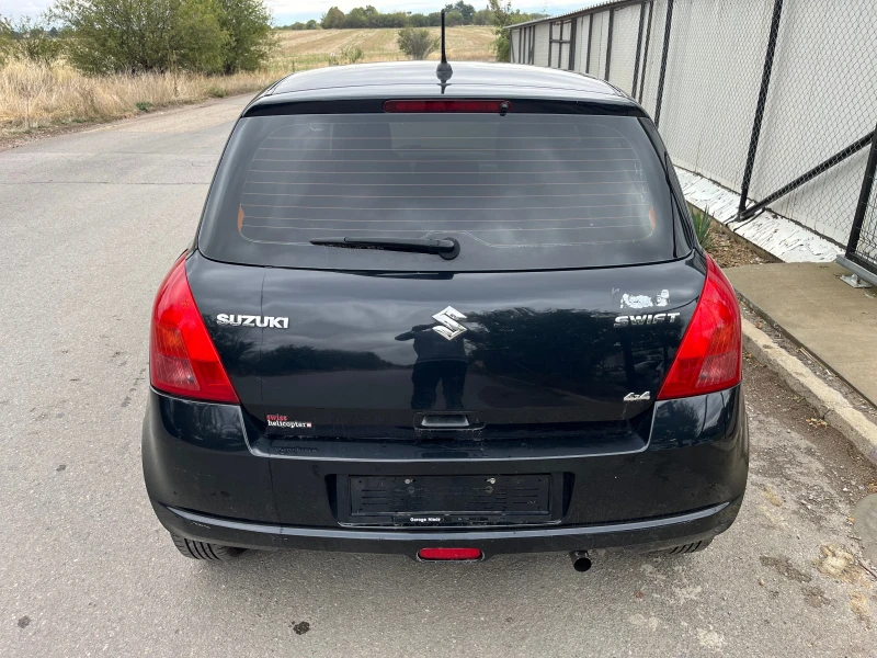 Suzuki Swift 1.3 4х4, снимка 6 - Автомобили и джипове - 52172812
