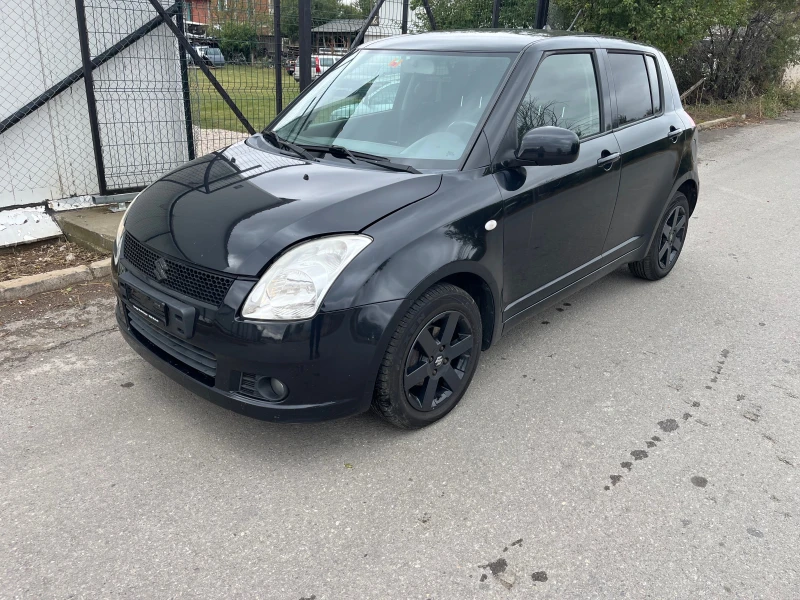 Suzuki Swift 1.3 4х4, снимка 3 - Автомобили и джипове - 52172812