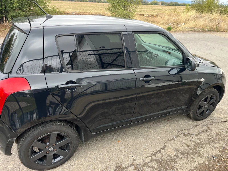 Suzuki Swift 1.3 4х4, снимка 8 - Автомобили и джипове - 52172812