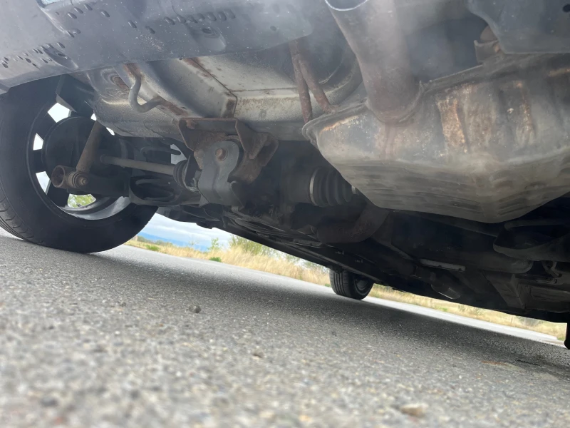 Suzuki Swift 1.3 4х4, снимка 9 - Автомобили и джипове - 52172812