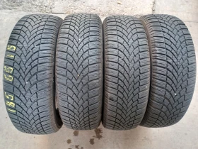 Гуми Зимни 185/65R15, снимка 1 - Гуми и джанти - 47187591