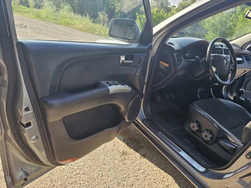 Kia Sportage, снимка 9 - Автомобили и джипове - 52806639