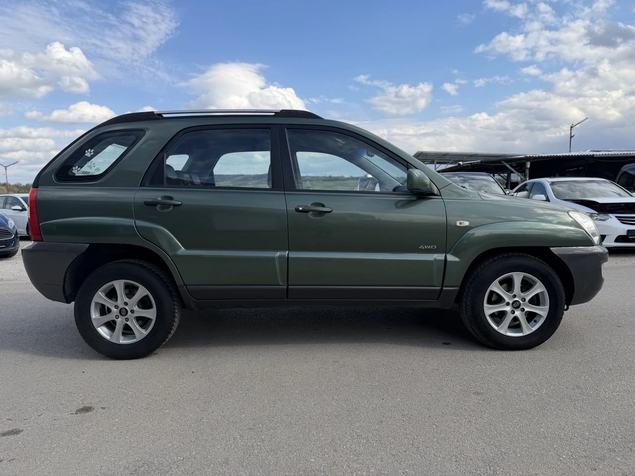 Kia Sportage 2.0 CRDi 4x4, снимка 7 - Автомобили и джипове - 54151933