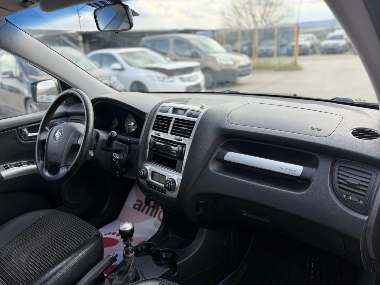 Kia Sportage 2.0 CRDi 4x4, снимка 10 - Автомобили и джипове - 54151933