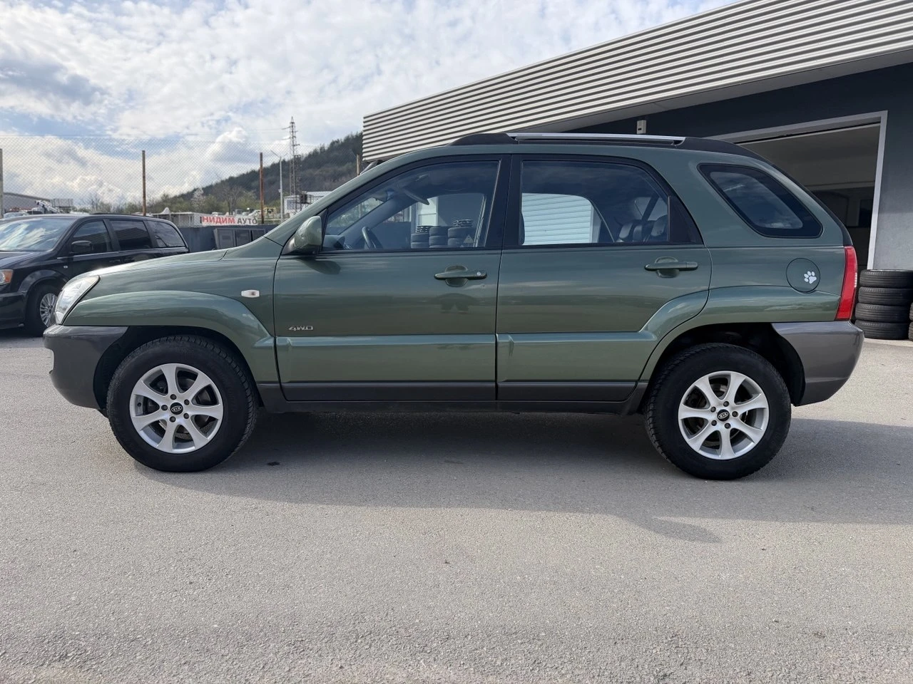 Kia Sportage 2.0 CRDi 4x4, снимка 8 - Автомобили и джипове - 54151933