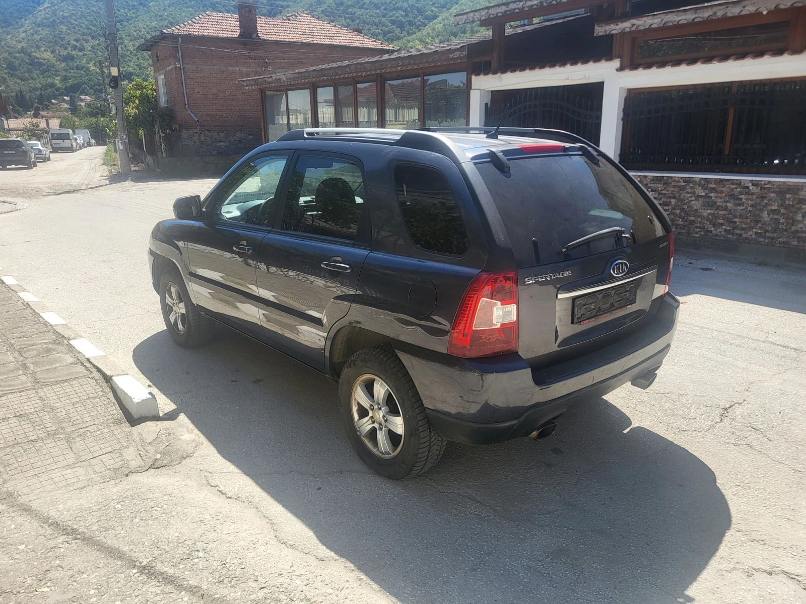 Kia Sportage 2.0i Gas/Benzin  140ps, снимка 7 - Автомобили и джипове - 55979345
