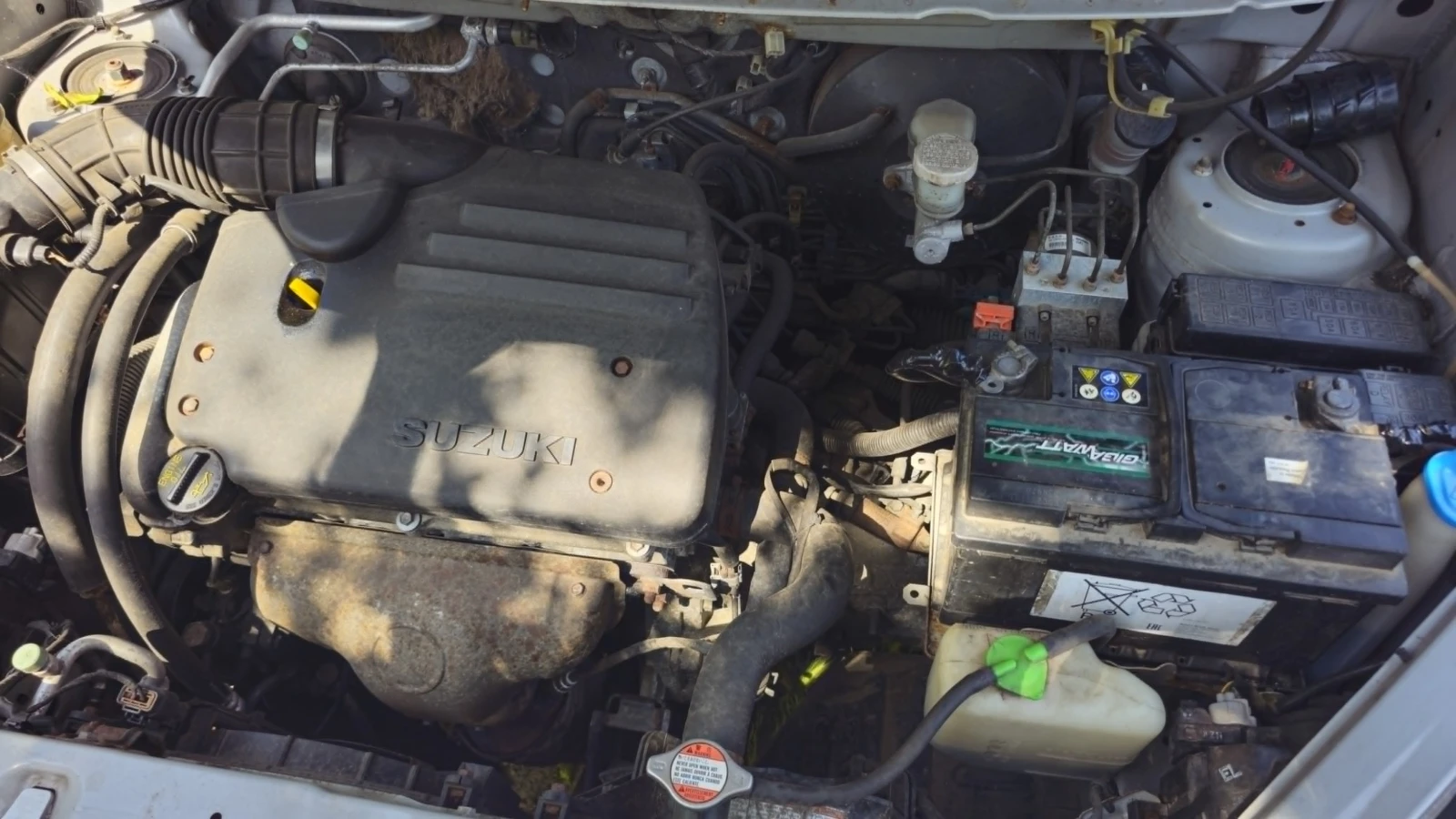 Suzuki Liana, снимка 7 - Автомобили и джипове - 54746757