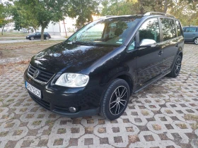 VW Touran 1.9 105+ + , снимка 1