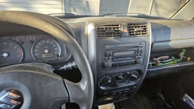 Suzuki Jimny 1.3 Газ/Бензин, снимка 8