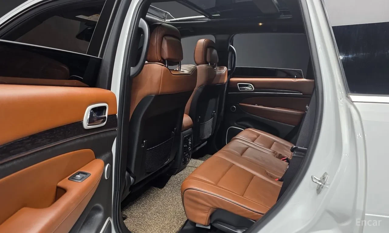 Jeep Grand cherokee 3.6 SUMMIT / DISTRONIC / ОБДУХ / COGNAC / H&K , снимка 12 - Автомобили и джипове - 54635859