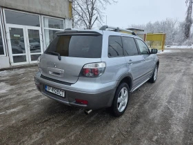 Mitsubishi Outlander 2.4I ПАНОРАМА ОБСЛУЖЕН - 3300 € / 6454.24 лв. - 94966217 5