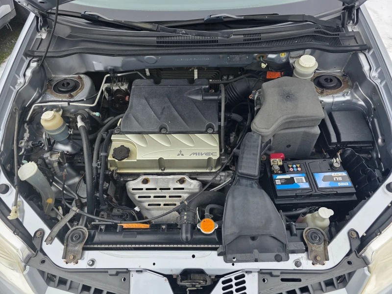 Mitsubishi Outlander 2.4I ПАНОРАМА ОБСЛУЖЕН, снимка 17 - Автомобили и джипове - 53357836