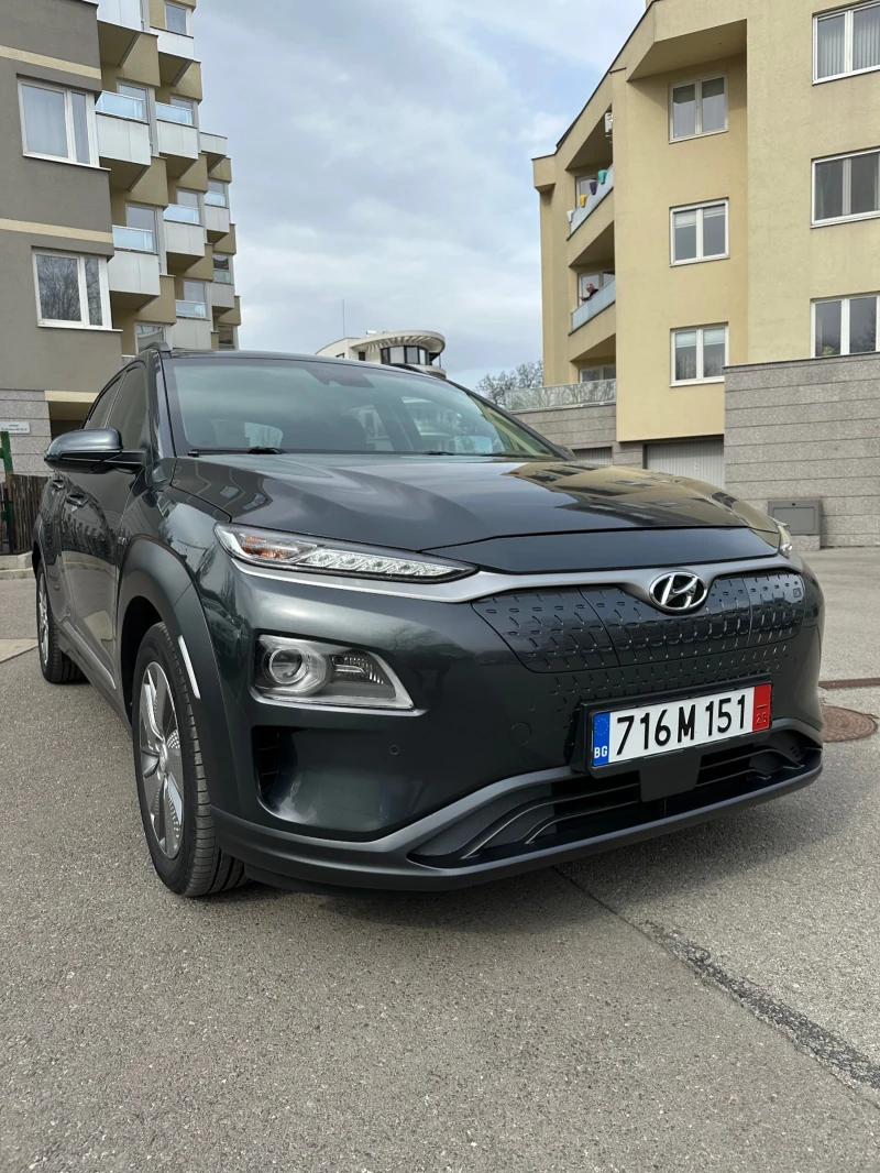 Hyundai Kona 64KWh PREMIUM/FULL ASSIST/DISTR/HEADUP/SOH100%, снимка 1 - Автомобили и джипове - 49963143