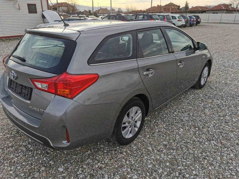 Toyota Auris 1. 8 Hybrid Synergy Drive EURO5B. , снимка 4 - Автомобили и джипове - 46112535