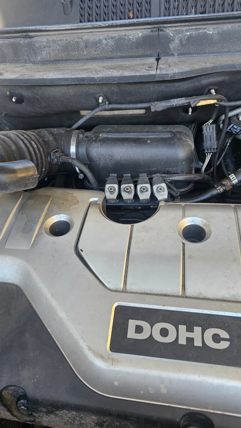 Chevrolet Captiva 2.4 dw, снимка 14 - Автомобили и джипове - 52928876