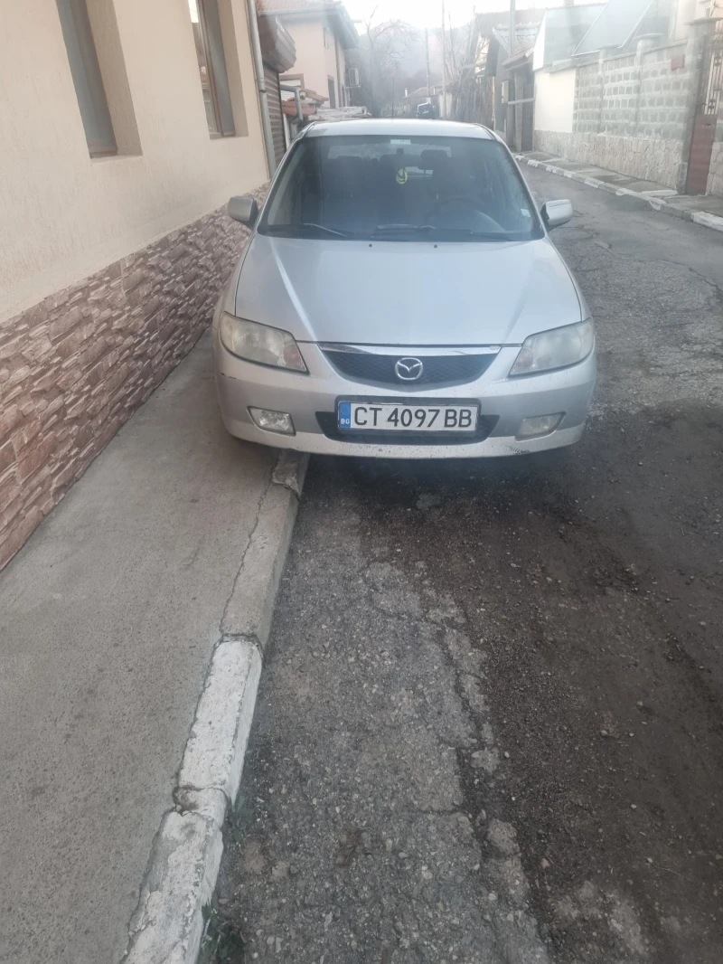 Mazda 323, снимка 1 - Автомобили и джипове - 48521789