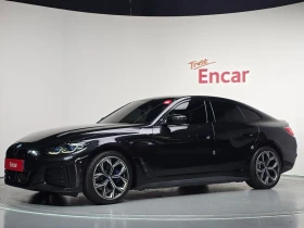������ BMW i4