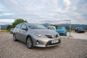 Toyota Auris Touring Sports Hybrid 1.8, снимка 2