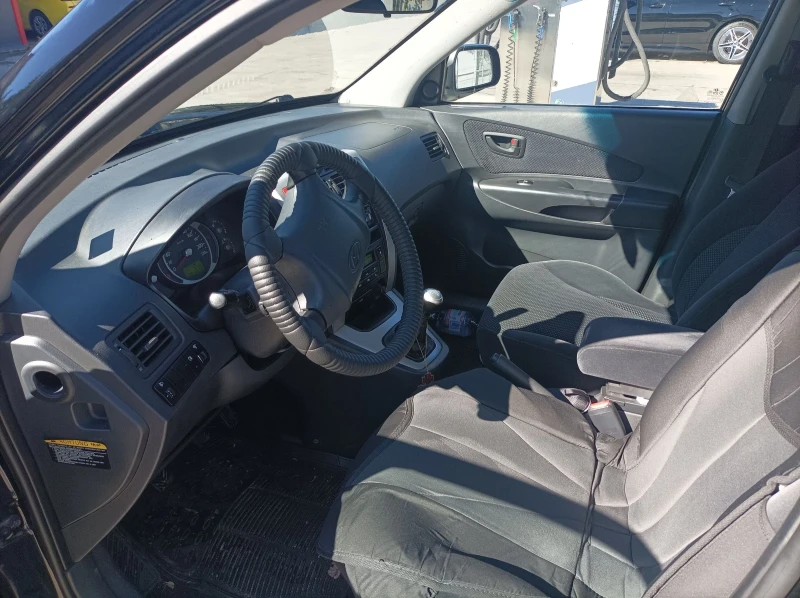 Hyundai Tucson crd, снимка 9 - Автомобили и джипове - 47421749