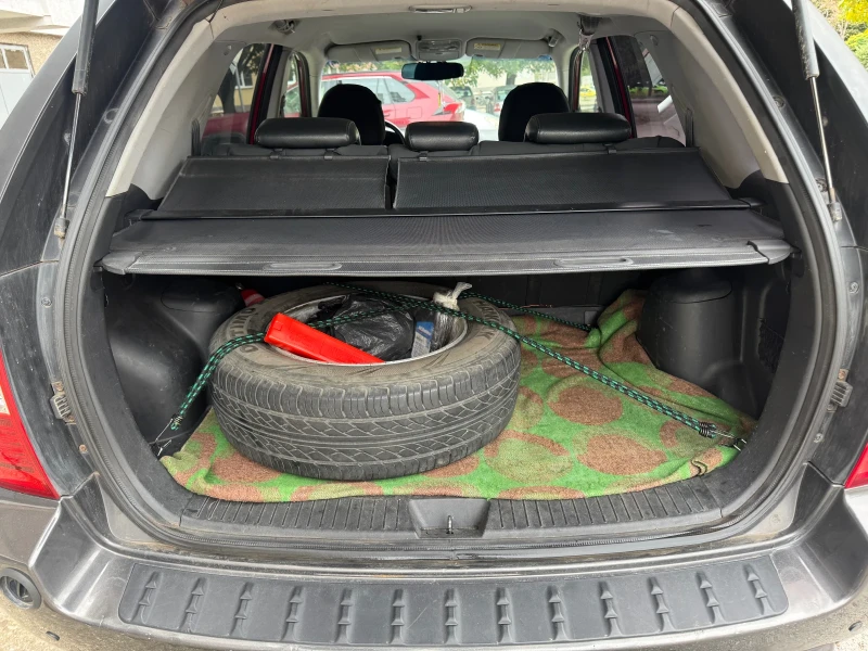 Kia Sportage, снимка 12 - Автомобили и джипове - 52500983