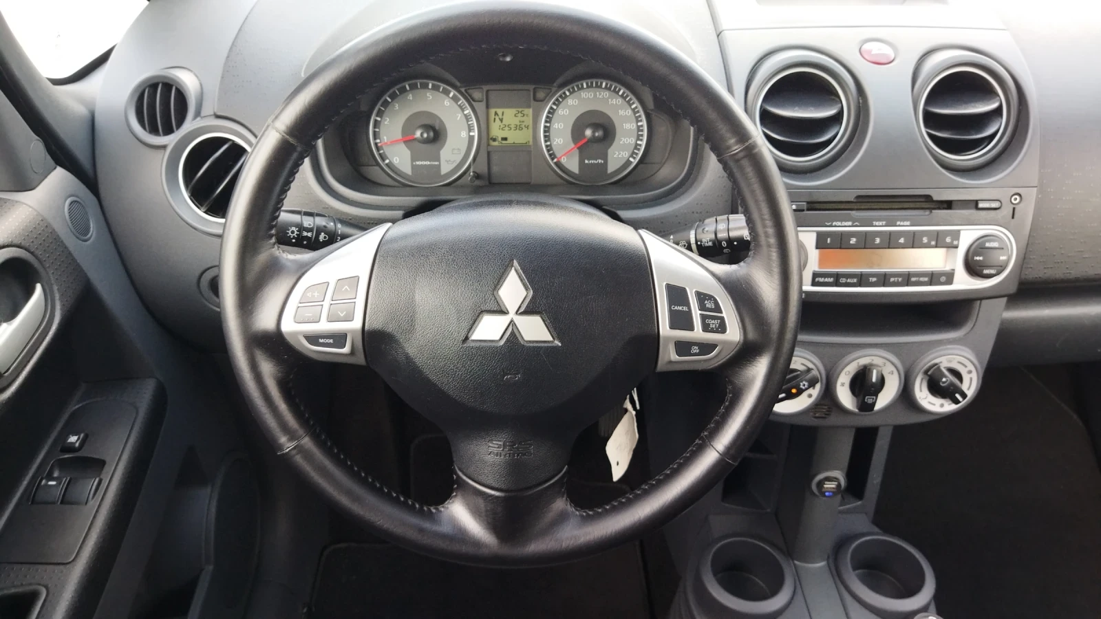 Mitsubishi Colt 1.3i АВТОМАТИК Швейцария - изображение 8