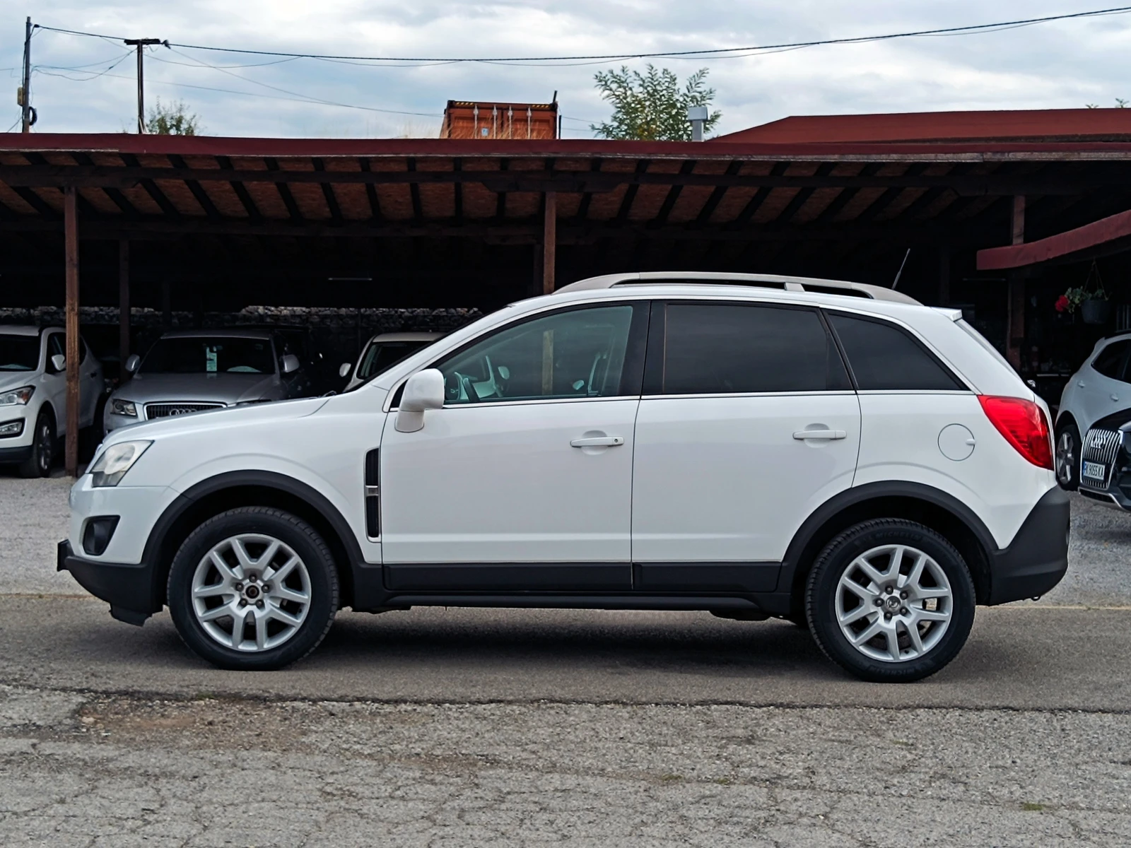 Opel Antara 2.2 CDTi* 4x4* АВТОМАТИК* COSMO* NAVI* КОЖА* EURO , снимка 7 - Автомобили и джипове - 56088475