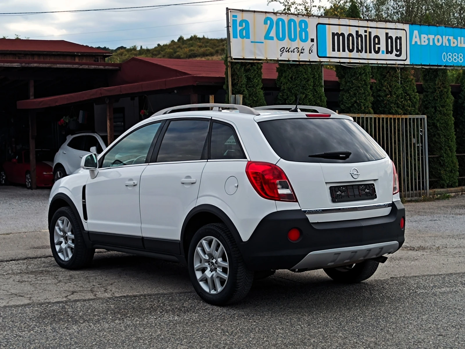Opel Antara 2.2 CDTi* 4x4* АВТОМАТИК* COSMO* NAVI* КОЖА* EURO , снимка 6 - Автомобили и джипове - 56088475