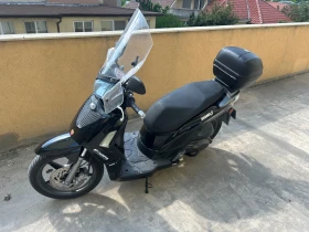  Kymco People