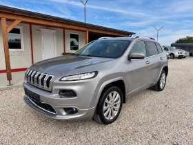 ������ Jeep Cherokee