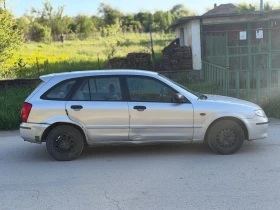 Mazda 323 1.3i КЛИМАТИК, снимка 2